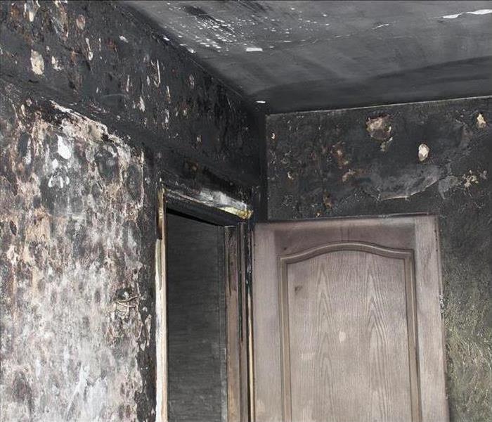 Smoke damaged walls and ceilings.